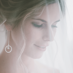 Image of Bride wearing a wedding veil. 